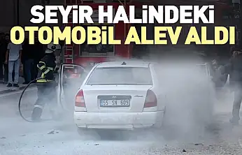 Seyir halindeki otomobil alev aldı
