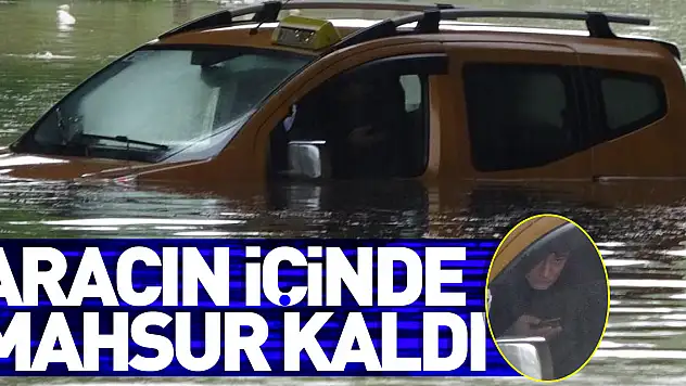 Samsun'da taksici selde aracıyla suyun içinde mahsur kaldı