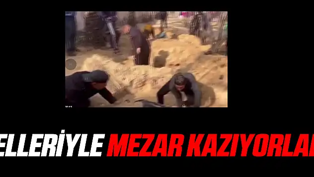 Elleriyle mezar kazıyorlar