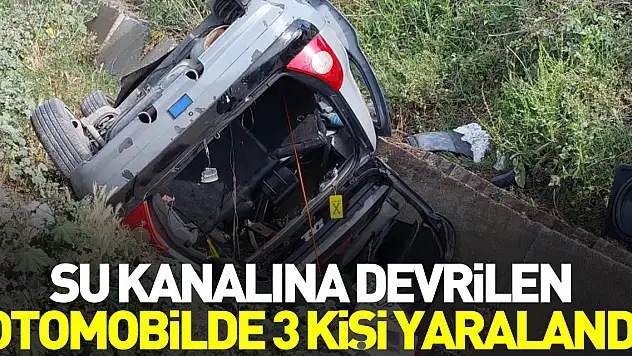 OTOMOBİL SU KANALINA DEVRİLDİ