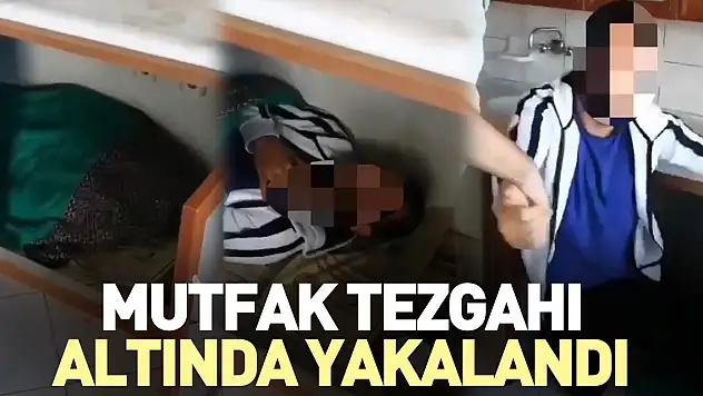 Mutfak tezgahı altında yakalandı