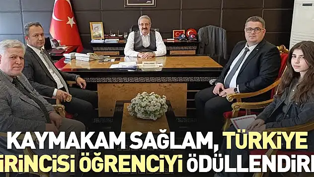 Kaymakam Sağlam, Türkiye birincisi öğrenciyi ödüllendirdi