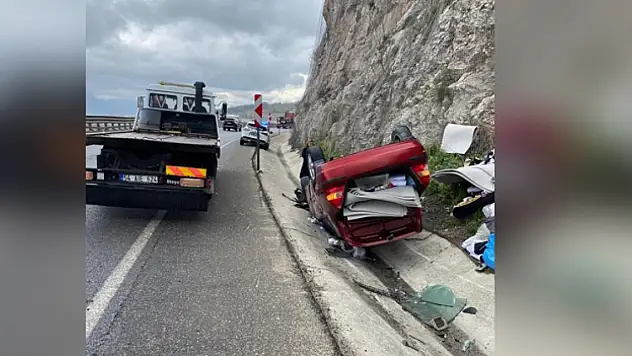 Takla atan otomobilden yara almadan kurtuldu