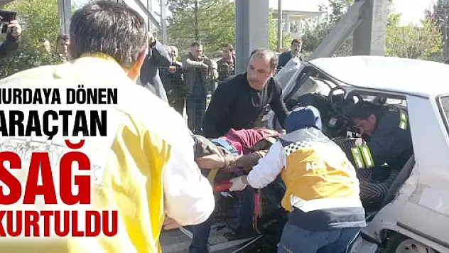 HURDAYA DÖNEN ARAÇTAN SAĞ KURTULDU