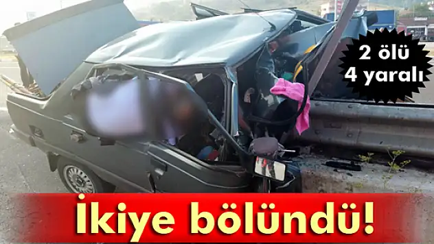 Bariyerlere çarpan otomobil ikiye bölündü