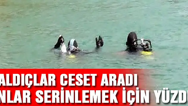 Dalgıçlar ceset aradı onlar serinlemek için yüzdü