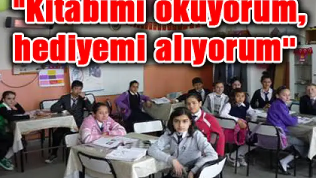 'Kitabımı okuyorum, hediyemi alıyorum''