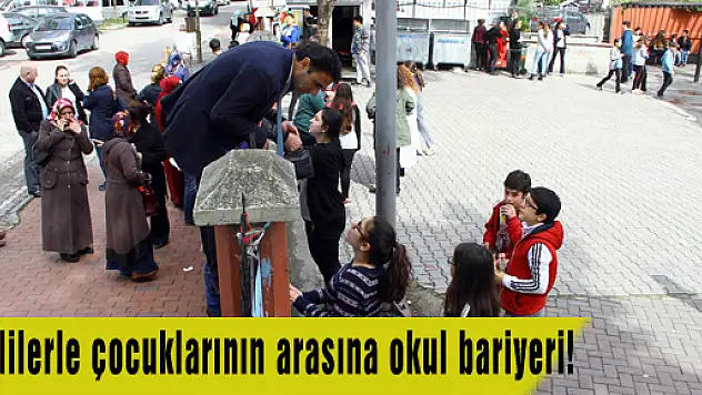 Velilerle çocuklarının arasına okul bariyeri!