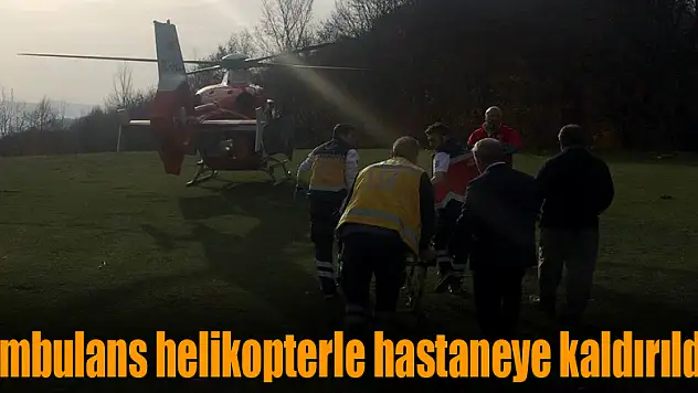 Devrilen traktörün altında kalan şahıs ambulans helikopterle hastaneye kaldırıldı