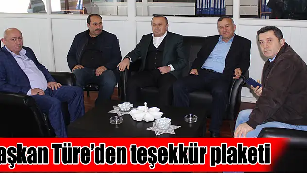 Başkan Türe'den teşekkür plaketi