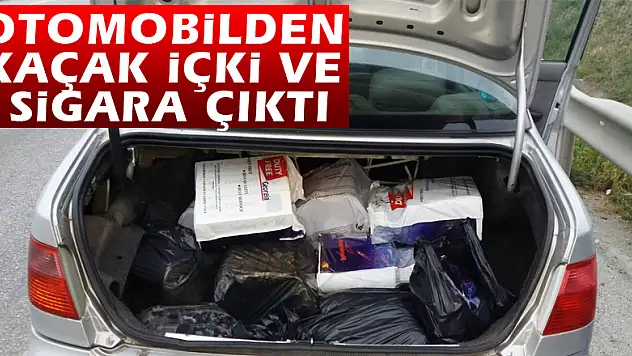 Otomobilden kaçak içki ve sigara çıktı
