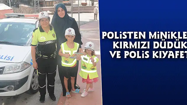 Polisten miniklere kırmızı düdük ve polis kıyafeti