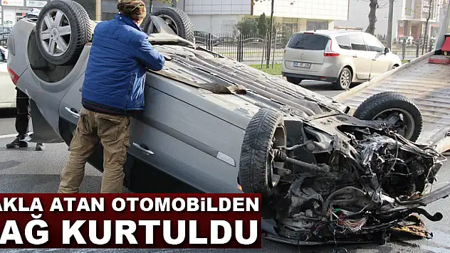 Takla atan otomobilden sağ kurtuldu