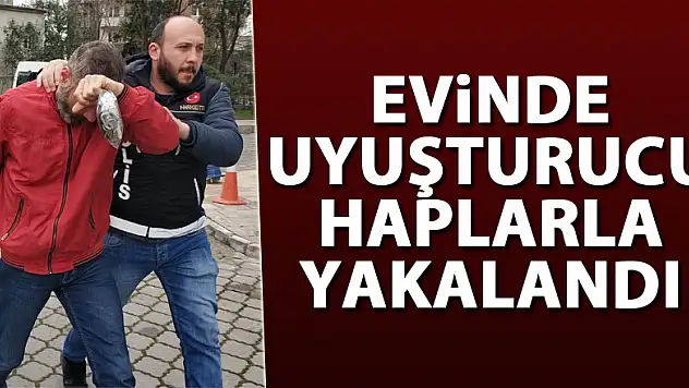 Evinde uyuşturucu haplarla yakalandı