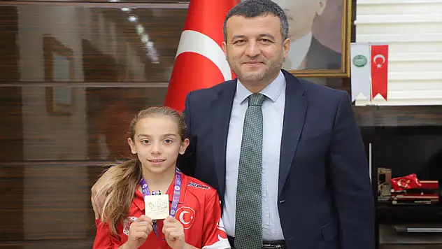 DÜNYA ŞAMPİYONUNDAN BAŞKAN DOĞAN'A ZİYARET