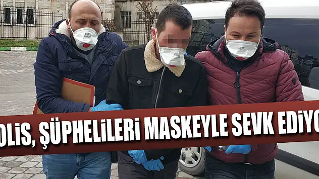 Polis, şüphelileri adliyeye maskeyle sevk ediyor