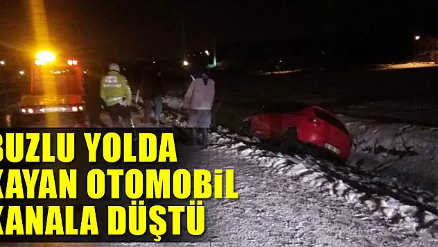 Buzlu yolda kayan otomobil kanala düştü