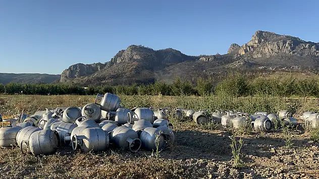 Alevlerden dolayı boşaltılan köyde 'Tüp tarlası'
