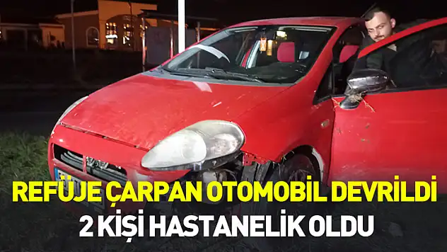 Samsun'da refüje çarpan otomobil devrildi: 2 kişi hastanelik oldu