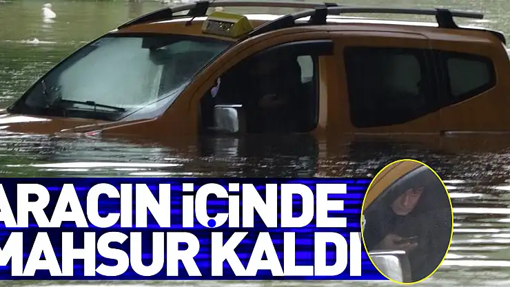 Samsun'da taksici selde aracıyla suyun içinde mahsur kaldı