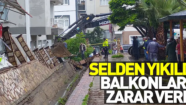 Samsun'da selden yıkılan parkın duvarı evlerin balkonlarına zarar verdi