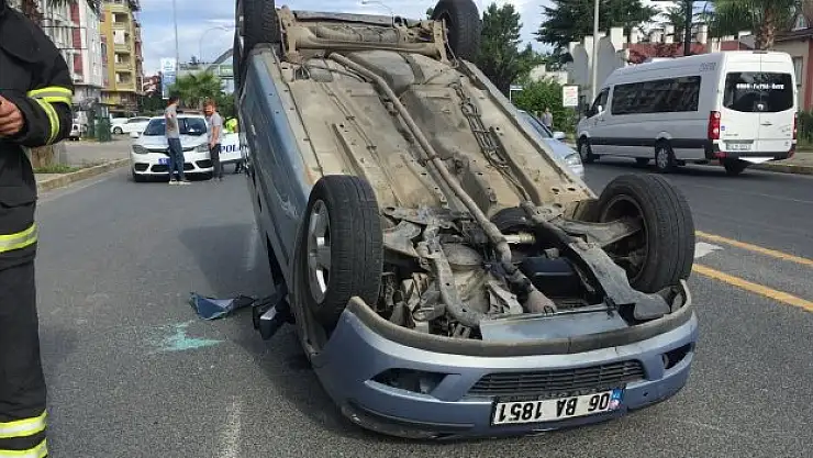 Takla atan araçtan yara almadan kurtuldu