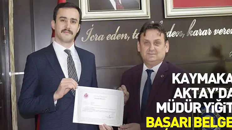 Kaymakam Aktay'dan Müdür Yiğit'e Başarı Belgesi