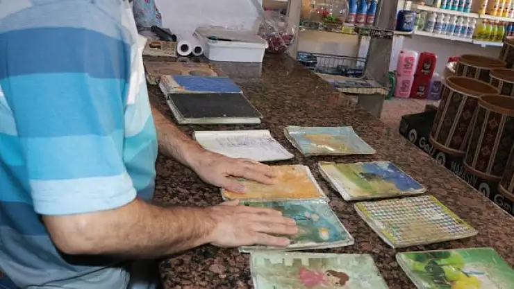 10 yıldır veresiye defteri biriktiriyor