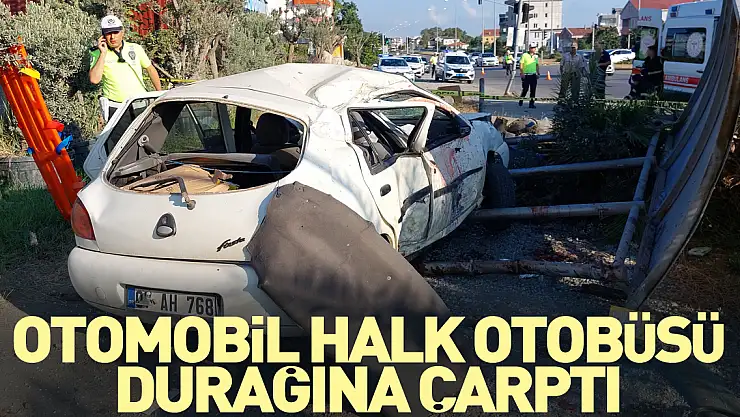 Halk otobüsü durağına çarptı