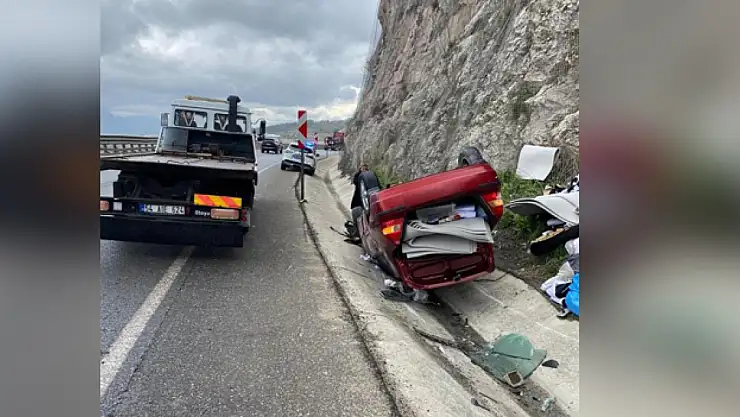 Takla atan otomobilden yara almadan kurtuldu