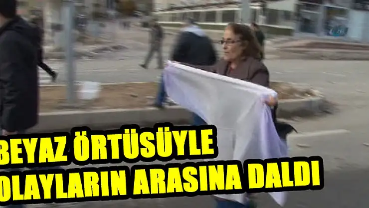 Beyaz örtüsüyle olayların arasına daldı