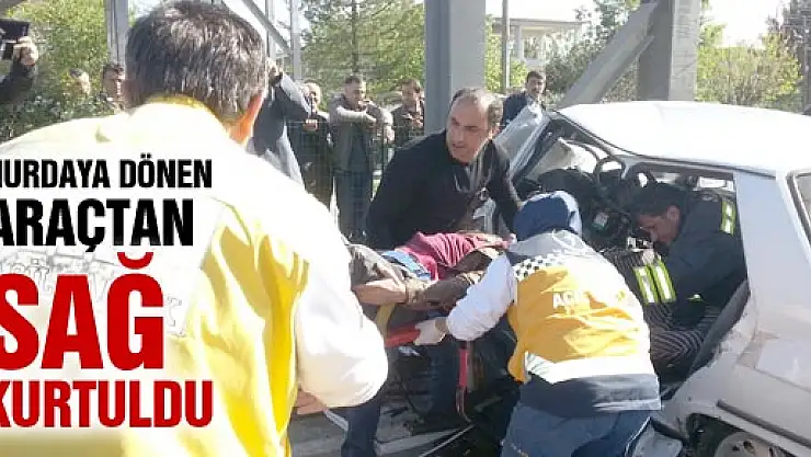 HURDAYA DÖNEN ARAÇTAN SAĞ KURTULDU