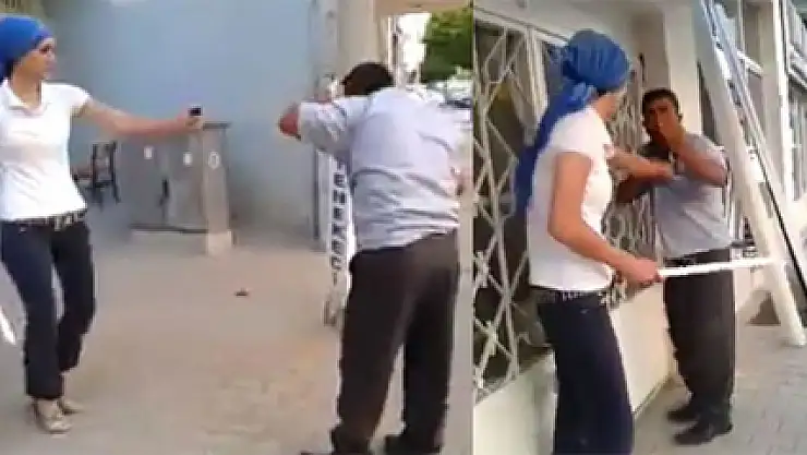 Kadın, adamı sopayla dövdü