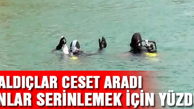 Dalgıçlar ceset aradı onlar serinlemek için yüzdü