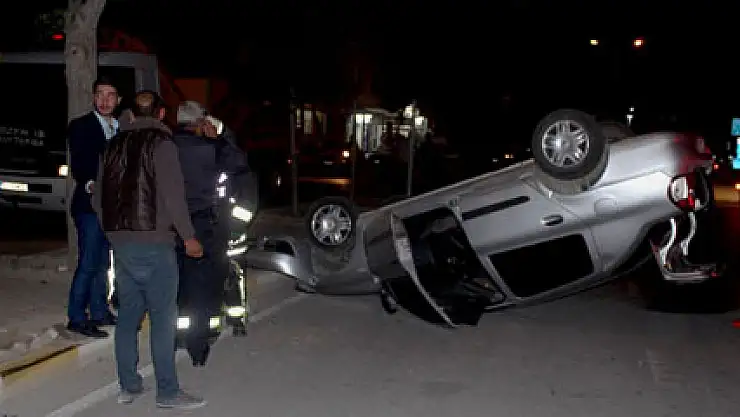 Takla atan otomobilden burnu bile kanamadan kurtuldu