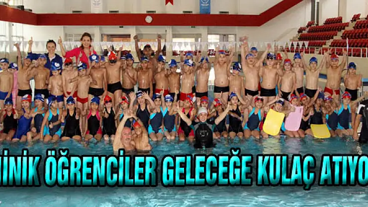 MİNİK ÖĞRENCİLER GELECEĞE KULAÇ ATIYOR 