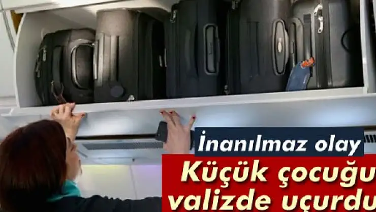 Küçük çocuğu valizde uçurdu