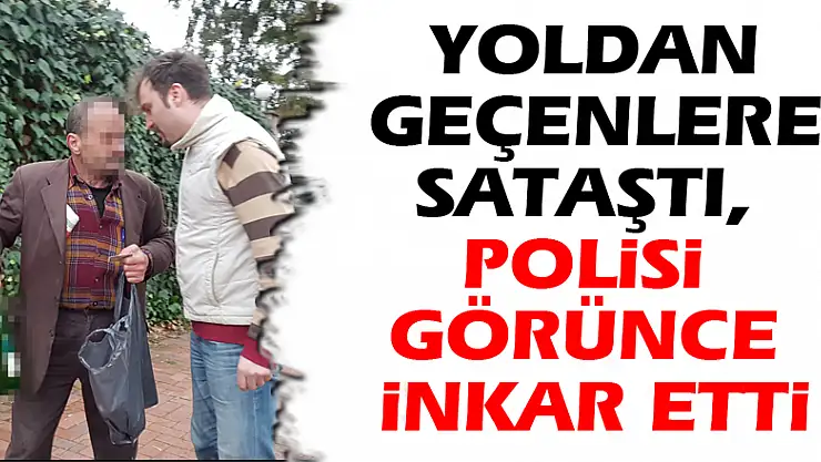 Yoldan geçenlere sataştı, polisi görünce inkar etti