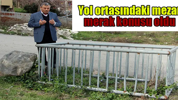 Yol ortasındaki mezar merak konusu oldu