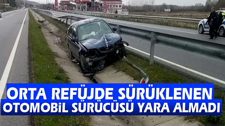 Orta refüjde sürüklenen otomobil sürücüsü yara almadı