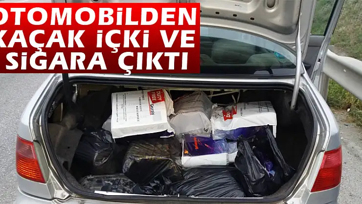 Otomobilden kaçak içki ve sigara çıktı