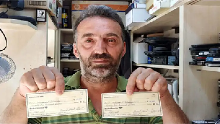 50 bin dolarlık çekleri polise teslim etti