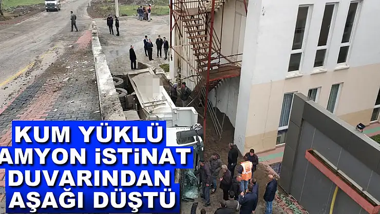Kum yüklü kamyon istinat duvarından aşağı düştü: 1 ağır yaralı