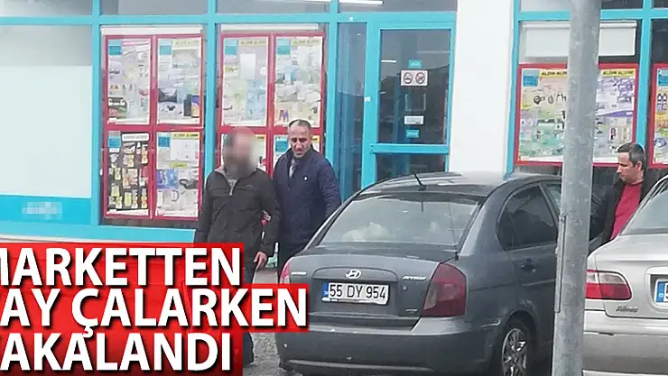 Marketten çay çalarken yakalandı