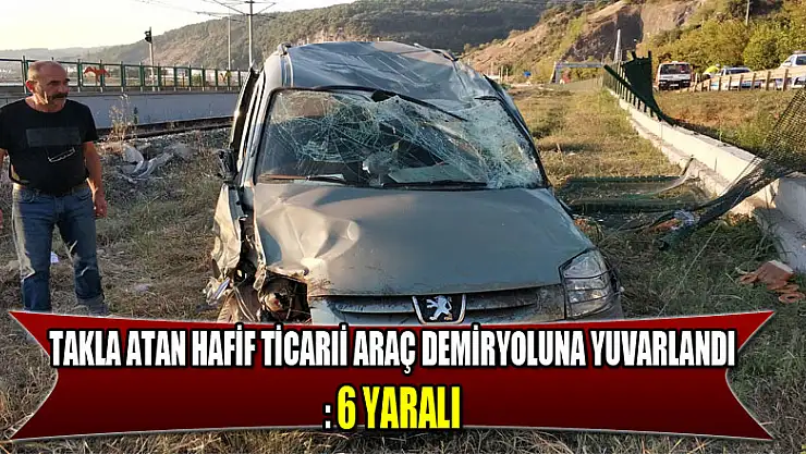 Takla atan hafif ticari araç demiryoluna yuvarlandı: 6 yaralı 
