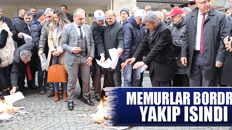 Memurlar bordro yakıp ısındı
