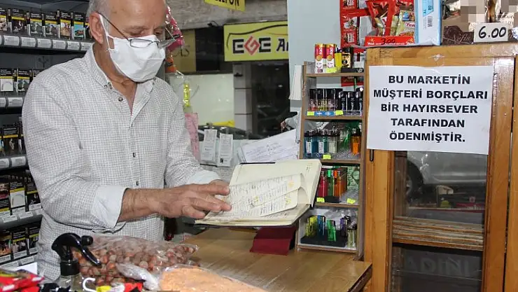 Gizemli hayırsever mahallenin borçlarını kapattı   