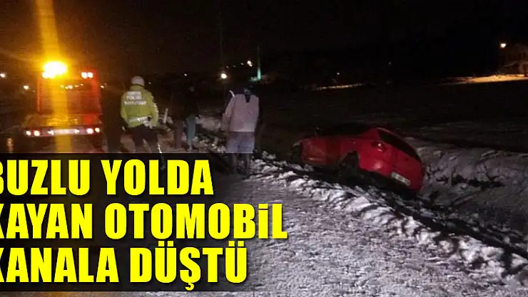 Buzlu yolda kayan otomobil kanala düştü
