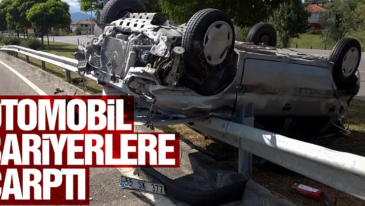 Otomobil bariyerlere çarpıp ters döndü: 2 yaralı