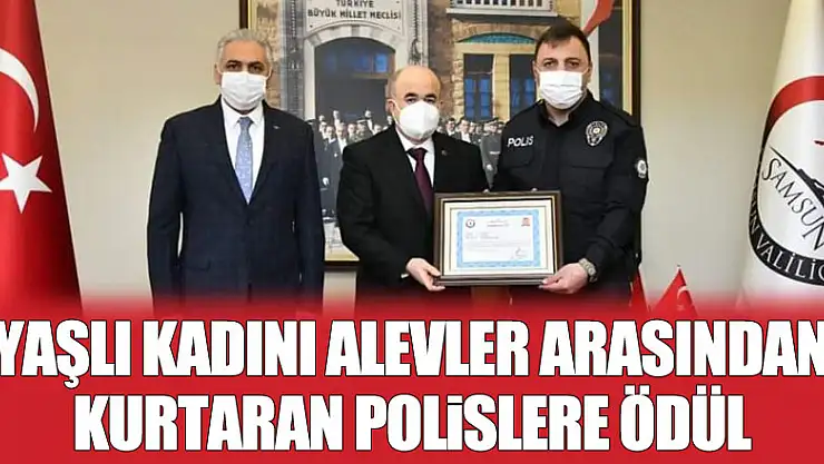 Yaşlı kadını alevler arasından sırtında taşıyarak kurtaran polislere ödül